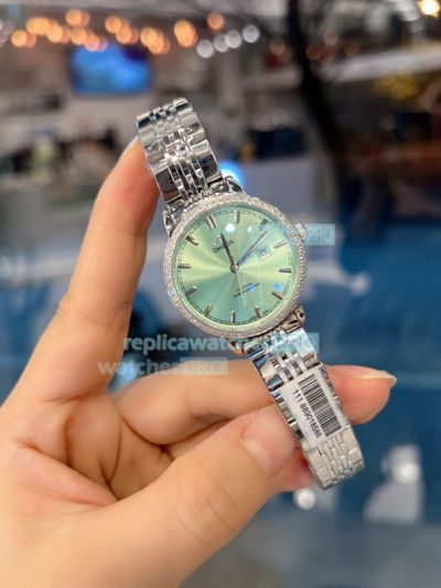 Omega Replica Ladies Watch Green Dial Diamonds Bezel Stainless Steel Strap 32mm